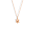 Rose gold sea turtle, its shell plates deepened by the blush metal