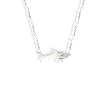 A crisp silvery finish runs from pointed nose to tail on the white gold shark charm