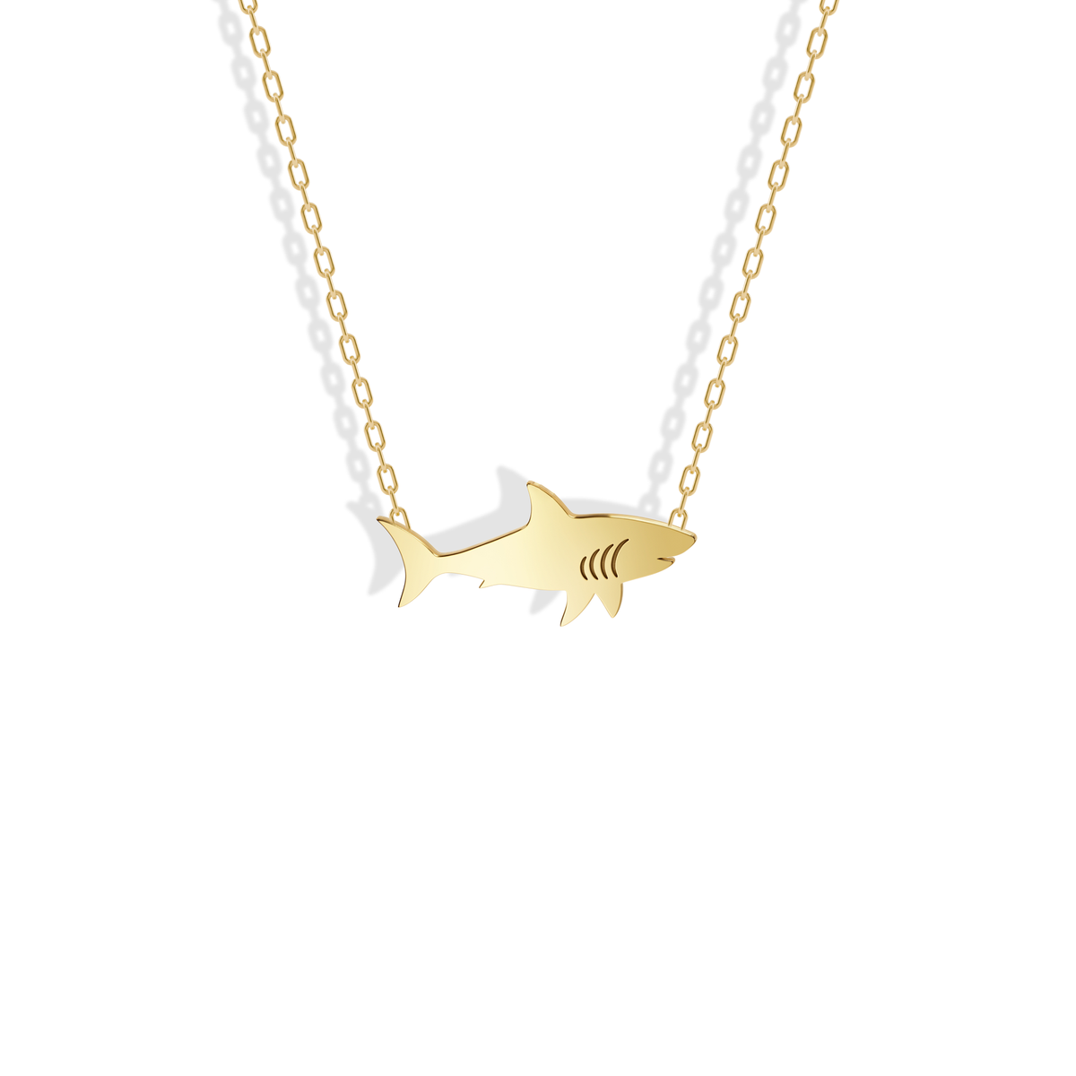 Shark Pendant Necklace in 14K yellow gold, streamlined from pointed nose to forked tail