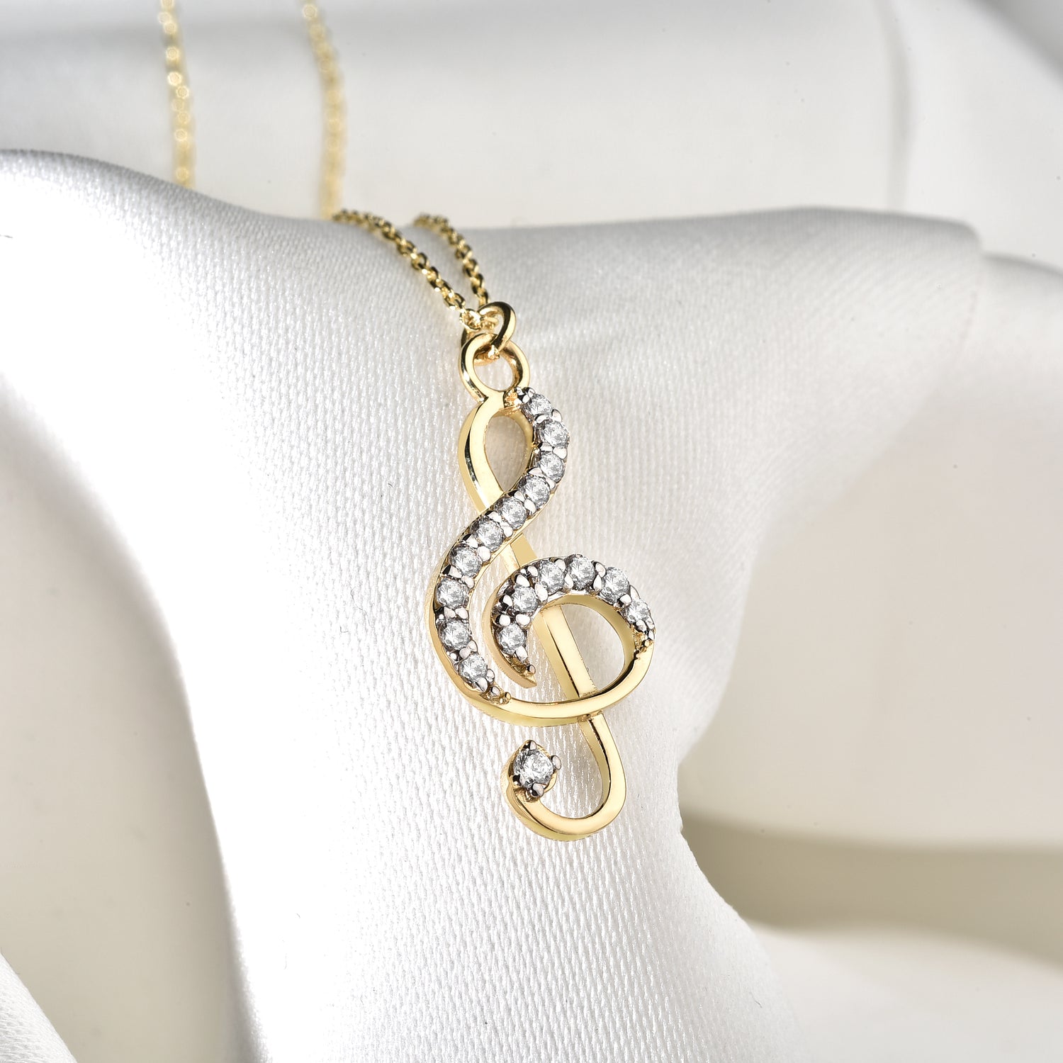 Stone Treble Clef Necklace 14K Gold / Silver – hand crafted musical note necklace inspired by melody jewelry. A meaningful piece for music lovers.
