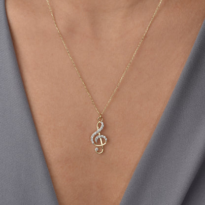 Stone Treble Clef Necklace 14K Gold / Silver – hand crafted musical note necklace inspired by melody jewelry. A meaningful piece for music lovers.