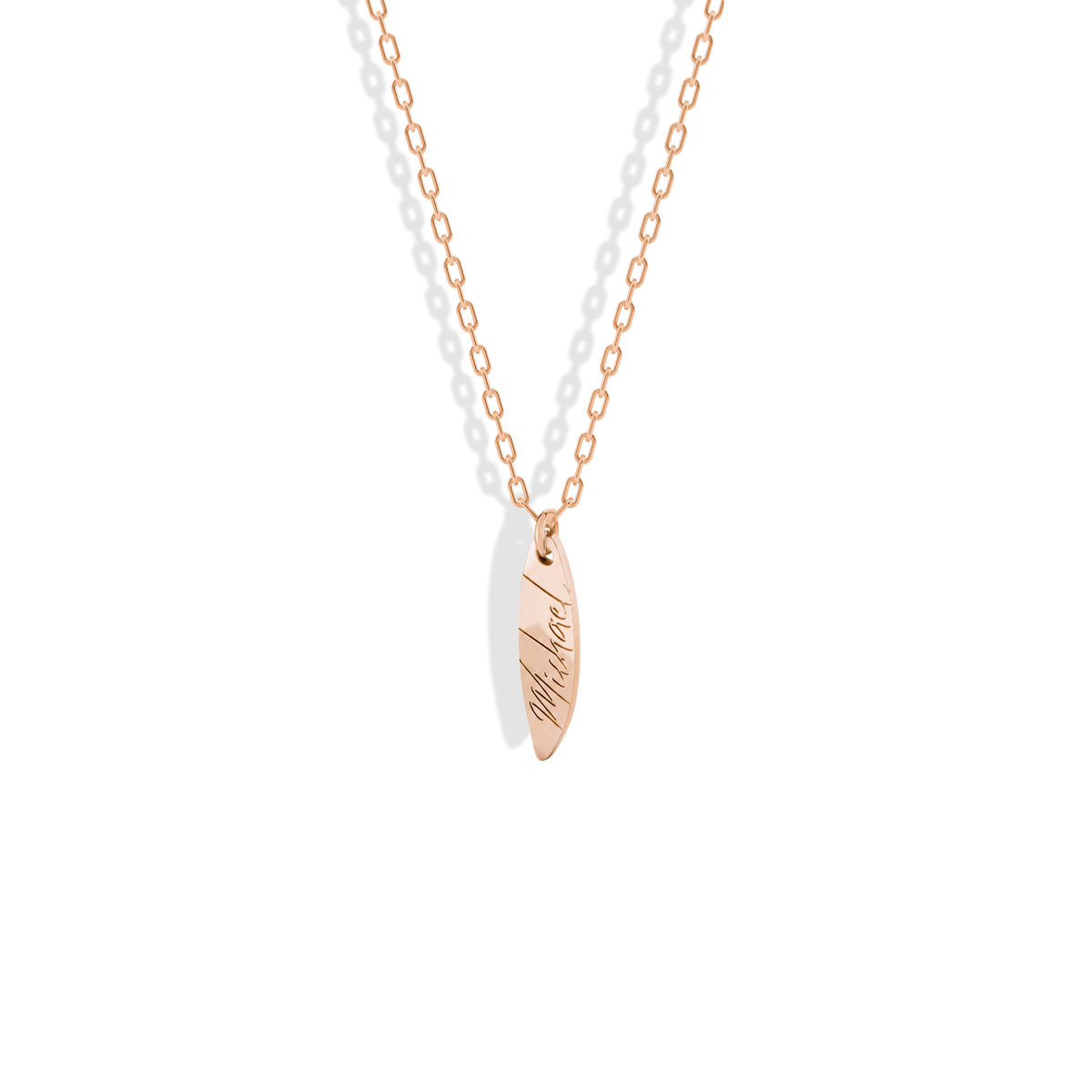 Personalised board pendant in 14K rose gold, the name engraved from nose to tail