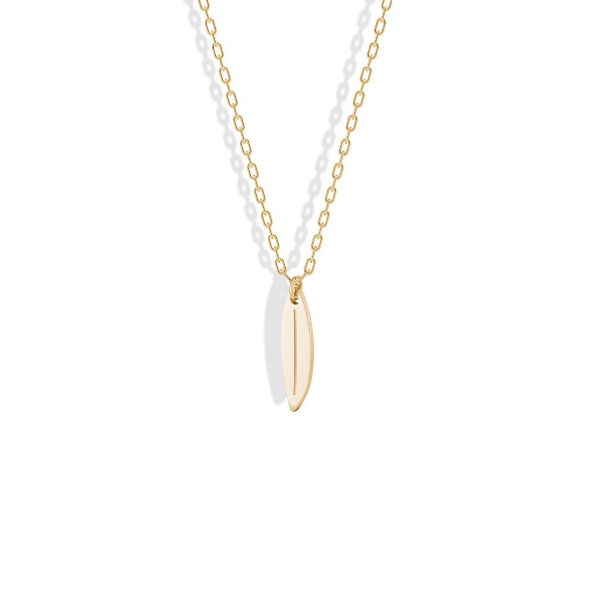 Studio shot of the Surfboard Pendant Necklace 14K Gold / Silver, a narrow yellow gold board hanging point down