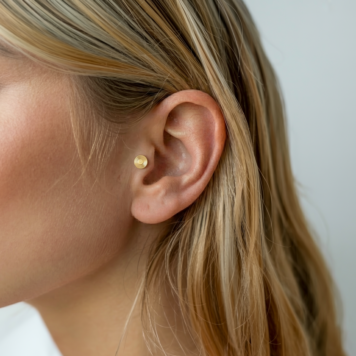 Vinyl record flatback ear piercing in solid 14K gold, a music inspired gift for a college student